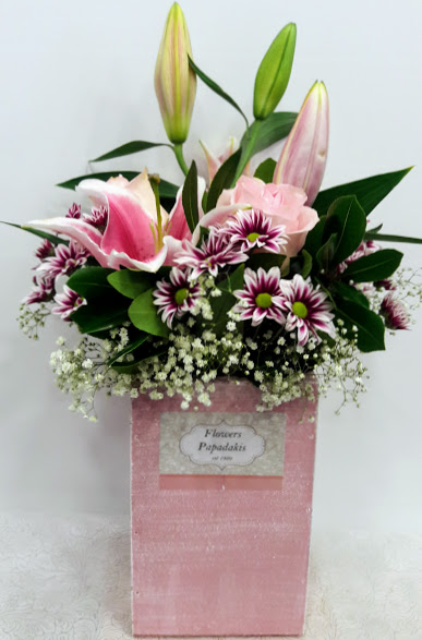 flowers in pink box